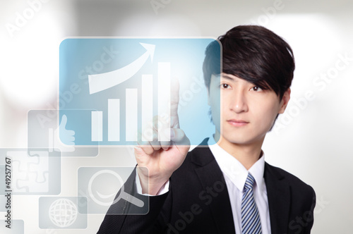 Photo: Business man touch all kinds of icon Business man touch all kinds of icon