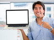 Businessman holding a computer