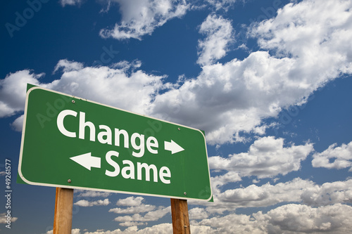 Photo: Change, Same Green Road Sign Over Clouds Change, Same Green Road Sign Over Clouds