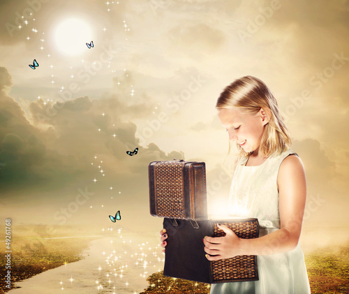 Photo: Blonde Girl Opening a Treasure Box Blonde Girl Opening a Treasure Box