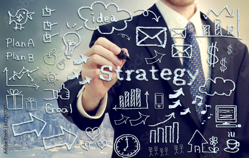 Photo: Businessman with hand writing pictures Businessman with hand writing pictures
