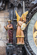 Magus and archangel Michael on Prague Astronomical Clock