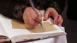 Writing in a notebook