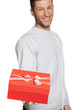 Handsome Man Offering A Present On White Background