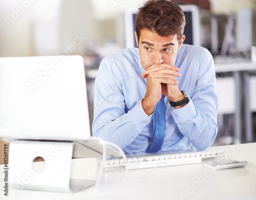 Photo: I hope this report is accepted! - Nervous businessman I hope this report is accepted! - Nervous businessman