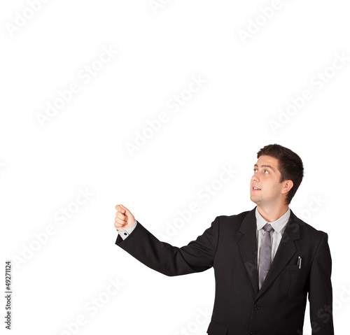 Photo: Young man gesturing with copy space Young man gesturing with copy space