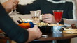 Friends having dinner at home, toasting