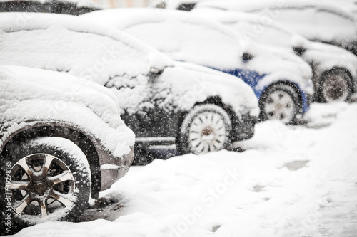 Photo: Cars covered with white snow Cars covered with white snow