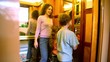 Mother With Two Kids Walk In E...