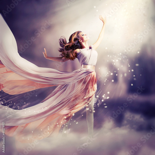 Photo: Beautiful Girl Wearing Long Chiffon Dress. Fantasy Scene Beautiful Girl Wearing Long Chiffon Dress. Fantasy Scene
