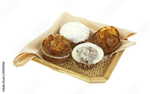 Photo: Assorted muffins in wicker basket Assorted muffins in wicker basket