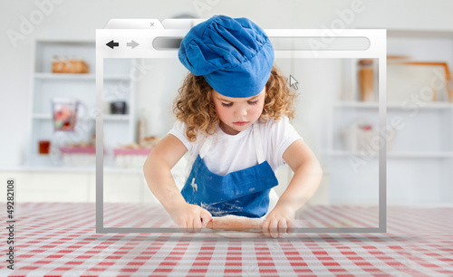 Photo: Digital internet window showing girl in cookery gear rolling pas Digital internet window showing girl in cookery gear rolling pas