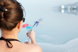 Girl with a cocktail on the beach