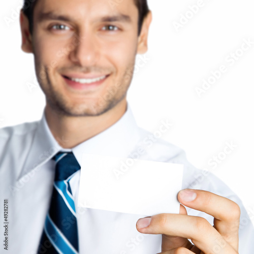 Photo: Businessman showing blank business or plastic card Businessman showing blank business or plastic card