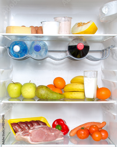 Photo: Open fridge full of fruits, vegetables and meat Open fridge full of fruits, vegetables and meat