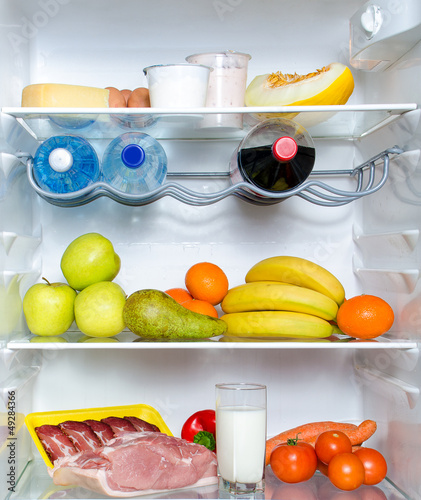 Photo: Open fridge full of fruits, vegetables and meat Open fridge full of fruits, vegetables and meat