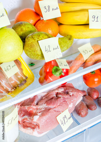 Photo: Open fridge full of fruits, vegetables and meat Open fridge full of fruits, vegetables and meat