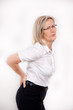 Photo: Woman with back pain Woman with back pain