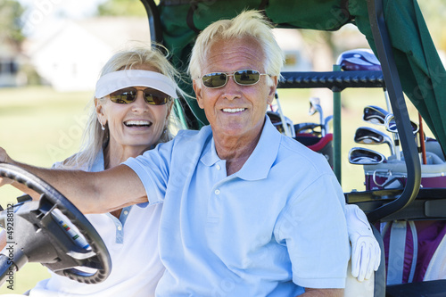 Photo: Senior Couple Playing Golf Driving Cart Buggy Senior Couple Playing Golf Driving Cart Buggy