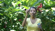 Young woman Blowing Soap Bubbles