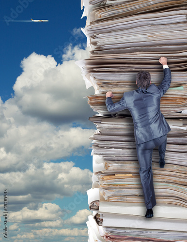 Photo: Businessmen climbing up Businessmen climbing up