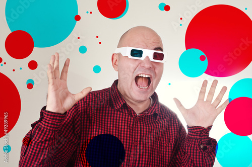 Photo: Scared man with 3d anaglyph glasses Scared man with 3d anaglyph glasses