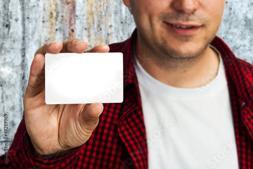 Photo: Construction worker with business card Construction worker with business card