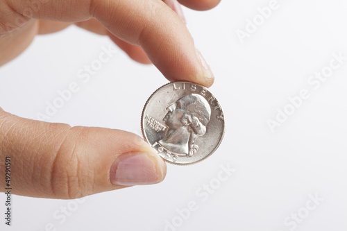 Photo: Hand Holding Quarter Hand Holding Quarter