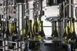 Italy, Sicily, wine bottles filled with wine in a wine factory