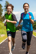 Girl and boy running, jumping outdoor