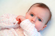 sad baby girl looking at camera close up
