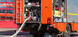 Feuerwehr Löschfahrzeug mit Schlauch