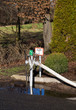 Feuerwehr Wasser Hydrant mit Schlauch