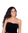 Brunette girl showing her shoulders with a black dress