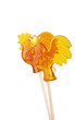Two sugar cockerel on a stick