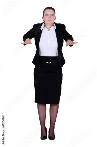 Photo: Businesswoman with palms out flat Businesswoman with palms out flat