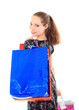 Beautiful woman with a shopping bags. Isolated on white.