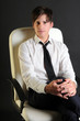 Young businessman sitting