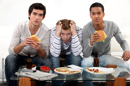 Photo: Boys eating burgers Boys eating burgers
