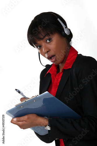 Photo: Surprised call-center manager Surprised call-center manager