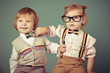 Vintage girl and boy on a green background.