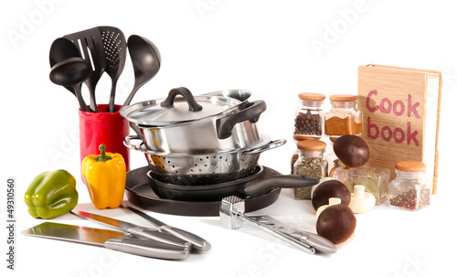 Photo: composition of kitchen tools,spices and vegetables isolated composition of kitchen tools,spices and vegetables isolated
