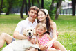 Photo: Happy family having fun outdoors Happy family having fun outdoors