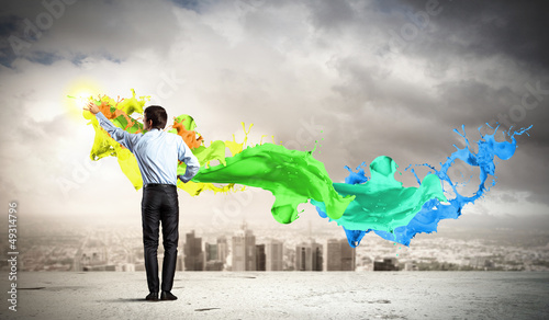 Photo: Man painting splashes Man painting splashes