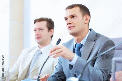 Photo: Two businessmen at meeting Two businessmen at meeting