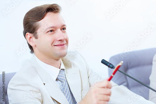 Photo: Businessman at meeting Businessman at meeting