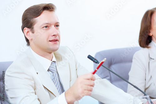 Photo: Businessman at meeting Businessman at meeting