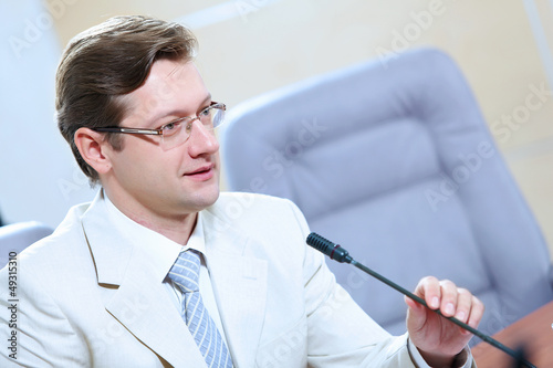Photo: Businessman at meeting Businessman at meeting