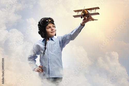 Photo: Little boy in pilot's hat Little boy in pilot's hat