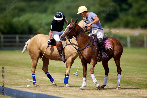 Photo: joueur de polo à cheval joueur de polo à cheval